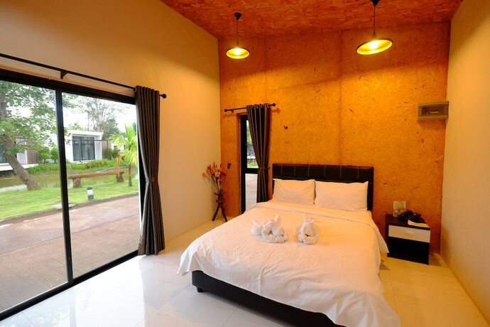 Imagen de la habitación del Hotel Nandc Resort. Foto 17