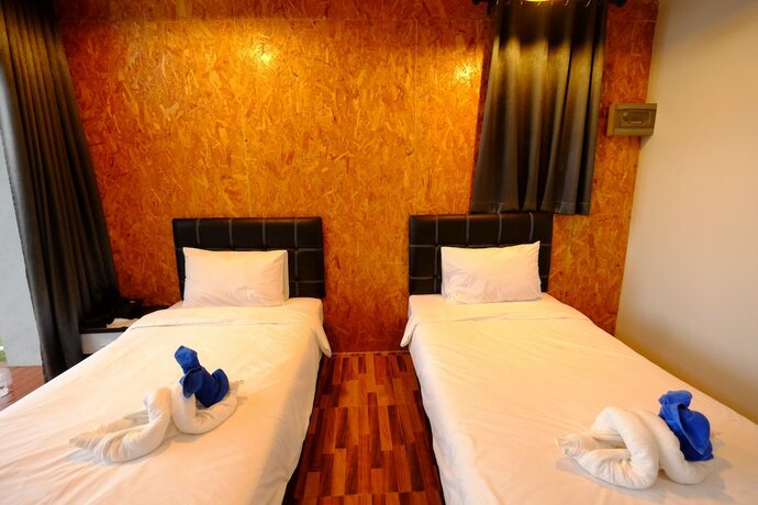 Imagen de la habitación del Hotel Nandc Resort. Foto 18