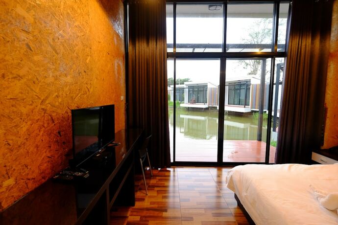 Imagen de la habitación del Hotel Nandc Resort. Foto 20