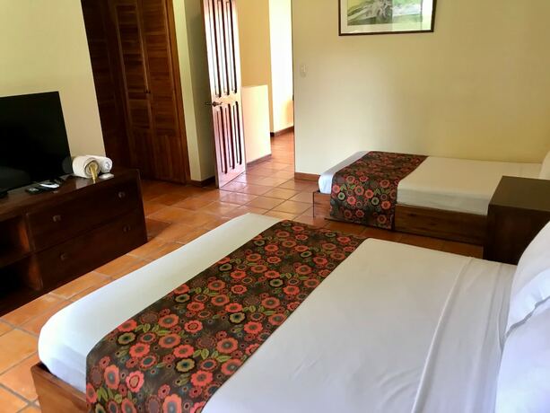 Imagen de la habitación del Hotel Nandel Beach Resort. Foto 14