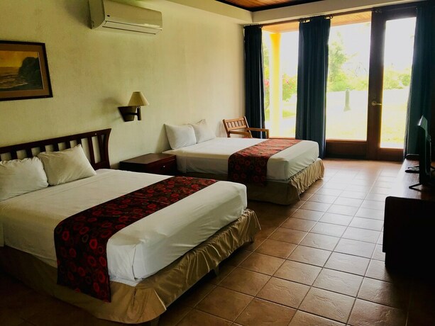 Imagen de la habitación del Hotel Nandel Beach Resort. Foto 20