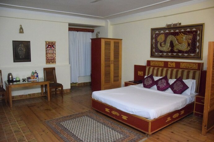 Imagen de la habitación del Hotel Nandini Residency, Kangra. Foto 14