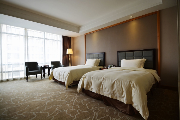 Imagen de la habitación del Hotel Nanhai Jiayi International. Foto 7