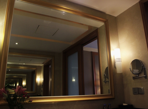 Imagen de la habitación del Hotel Nanhai Jiayi International. Foto 12