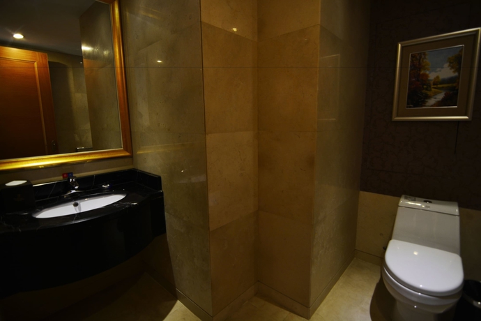 Imagen de la habitación del Hotel Nanhai Jiayi International. Foto 15