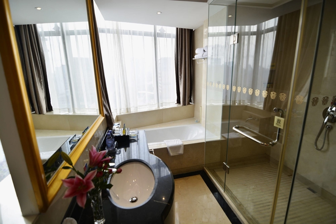 Imagen de la habitación del Hotel Nanhai Jiayi International. Foto 16