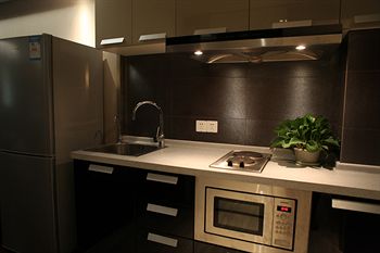Imagen de la habitación del Hotel Nanjing Kaibin Apartment - Kairun No. 5. Foto 2