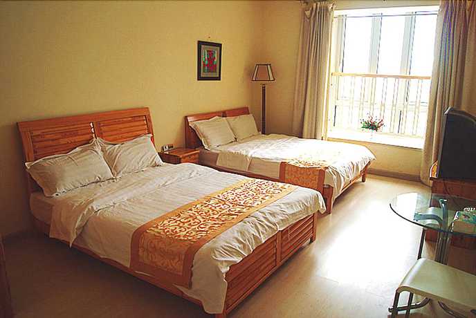 Imagen de la habitación del Hotel Nanjing Kaibin Apartment Xinjiekou. Foto 4