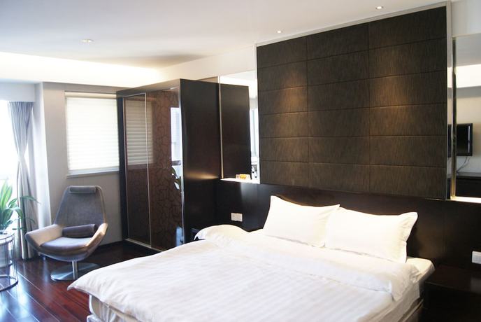 Imagen de la habitación del Hotel Nanjing Kaibin Apartment Zhujianglu Muma. Foto 7