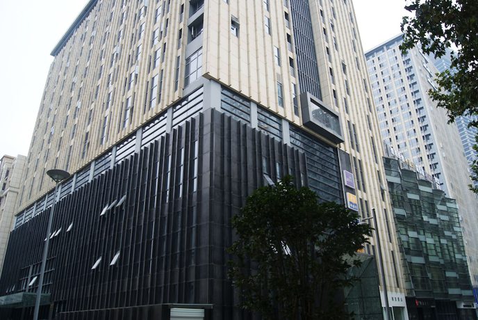 Imagen de la habitación del Hotel Nanjing Kaibin Apartment Zhujianglu Muma. Foto 11
