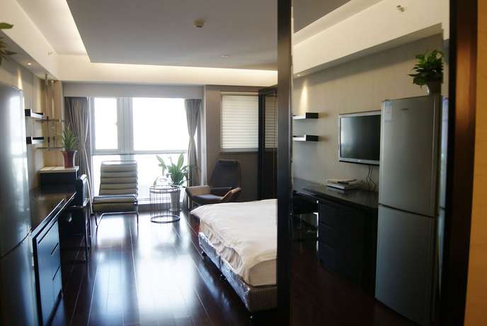 Imagen general del Hotel Nanjing Kaibin Apartment Zhujianglu Muma. Foto 2