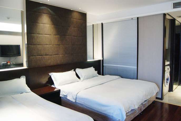Imagen general del Hotel Nanjing Kaibin Apartment Zhujianglu Muma. Foto 4