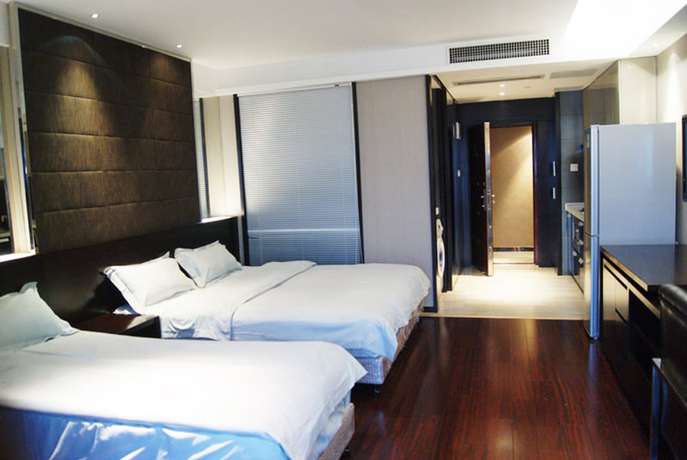 Imagen de los interiores del Hotel Nanjing Kaibin Apartment Zhujianglu Muma. Foto 18