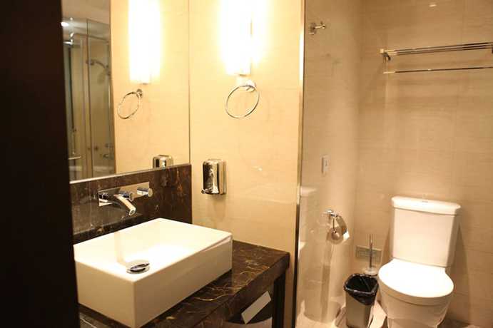 Imagen de la habitación del Hotel Nanjing Kaibin Apartment Zhujianglu Muma. Foto 13