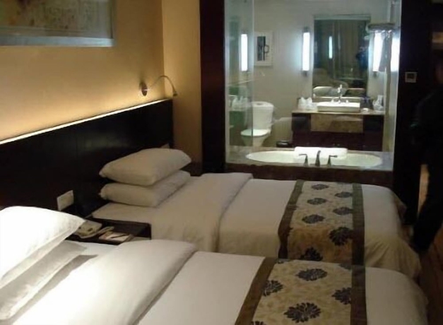 Imagen de la habitación del Hotel Nanjing New Century. Foto 14