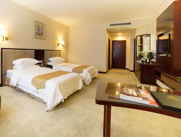 Imagen de la habitación del Hotel Nanjing Panda Jinling. Foto 9