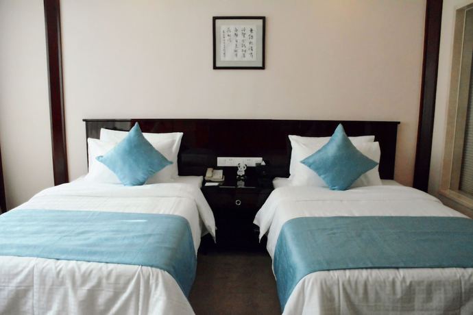 Imagen de la habitación del Hotel Nanjing Panda Jinling. Foto 12