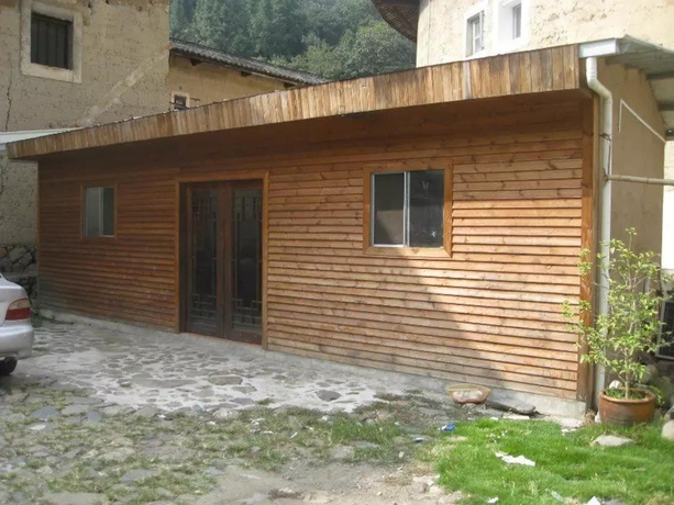 Imagen del bar/restaurante del Hotel Nanjing Tulou Qingdelou Inn. Foto 7