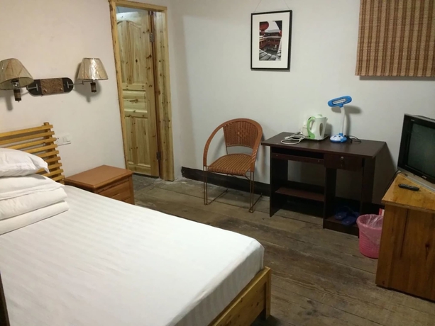 Imagen de la habitación del Hotel Nanjing Tulou Qingdelou Inn. Foto 13
