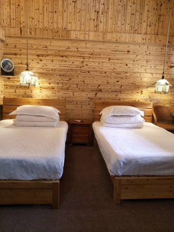 Imagen de la habitación del Hotel Nanjing Tulou Qingdelou Inn. Foto 15