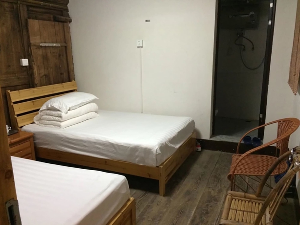 Imagen de la habitación del Hotel Nanjing Tulou Qingdelou Inn. Foto 16