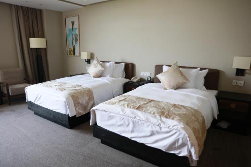 Imagen de la habitación del Hotel Nanjing University International Conference Center. Foto 20