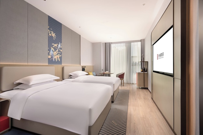 Imagen de la habitación del Hotel Nanning Huafengcheng ECHENG. Foto 2