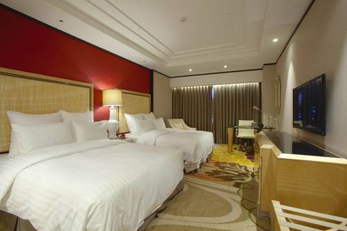 Imagen de la habitación del Hotel Nanning Landmark. Foto 5