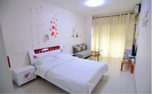 Imagen de la habitación del Hotel Nanning Qingzhou Rental Apartments. Foto 6