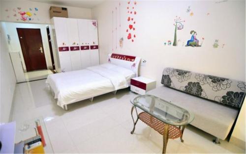Imagen de la habitación del Hotel Nanning Qingzhou Rental Apartments. Foto 7