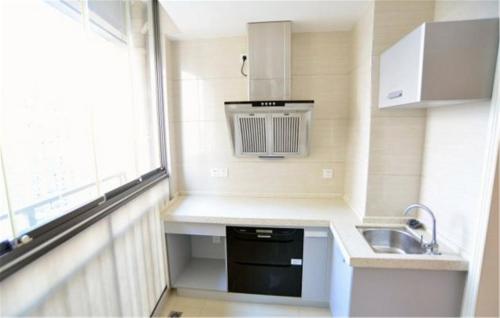 Imagen de la habitación del Hotel Nanning Qingzhou Rental Apartments. Foto 8