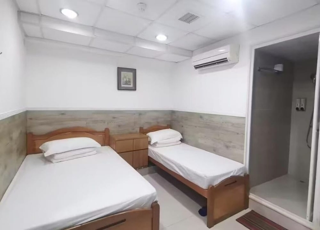 Imagen de la habitación del Hotel Nanqiang Hostel. Foto 12