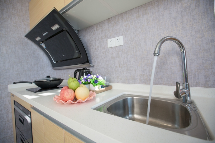 Imagen de la habitación del Hotel Nansha Apartment. Foto 7