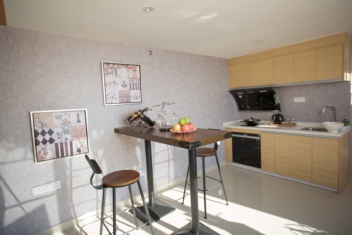 Imagen de la habitación del Hotel Nansha Apartment. Foto 8