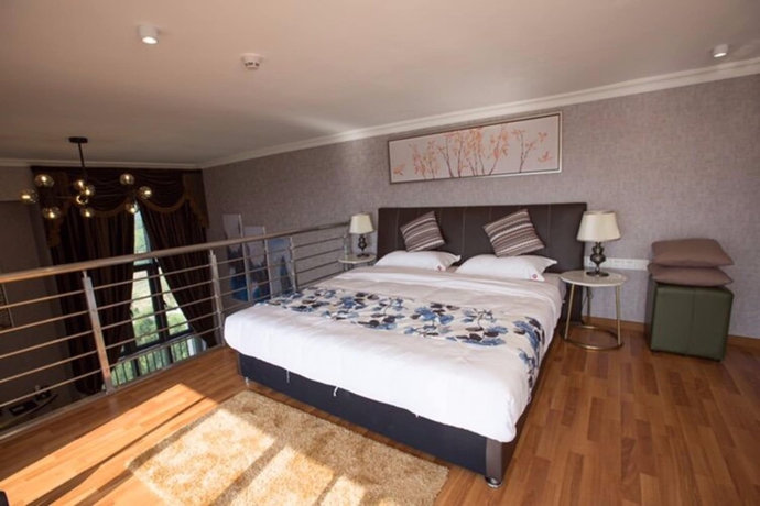 Imagen de la habitación del Hotel Nansha Apartment. Foto 11