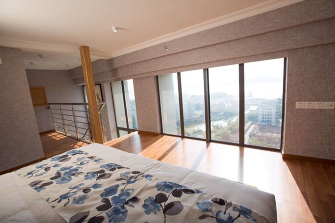 Imagen de la habitación del Hotel Nansha Apartment. Foto 13