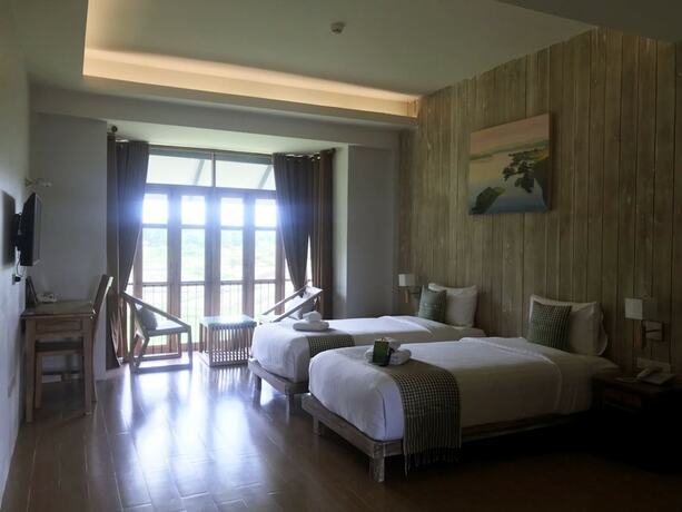 Imagen de la habitación del Hotel Nansripanna Resort. Foto 18