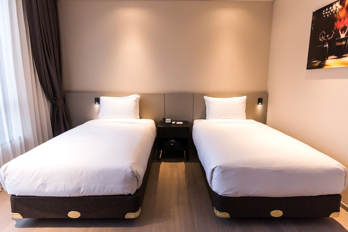 Imagen de la habitación del Hotel Nanta Jeju. Foto 12