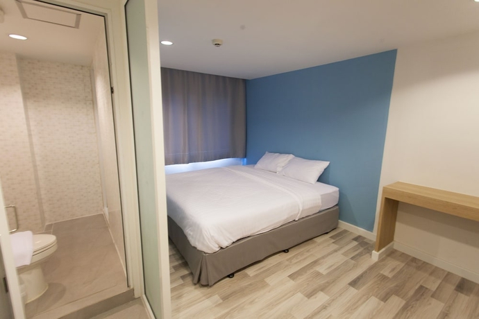 Imagen de la habitación del Hotel Nantra Cozy. Foto 2