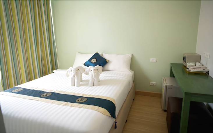 Imagen de la habitación del Hotel Nantra Cozy. Foto 6