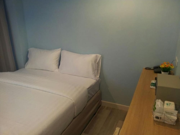 Imagen de la habitación del Hotel Nantra Cozy. Foto 8