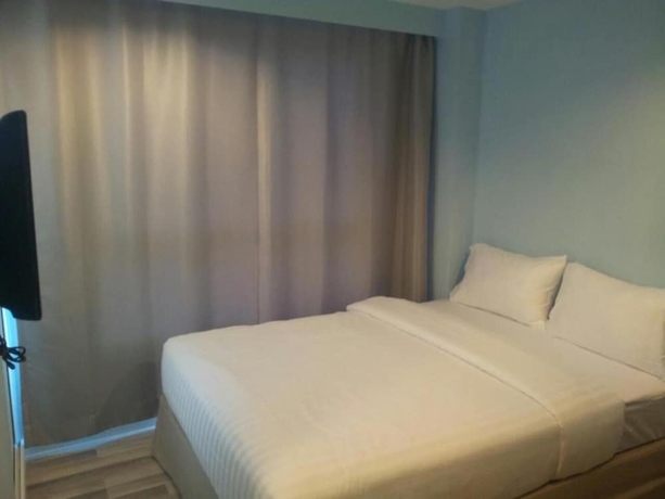 Imagen de la habitación del Hotel Nantra Cozy. Foto 9