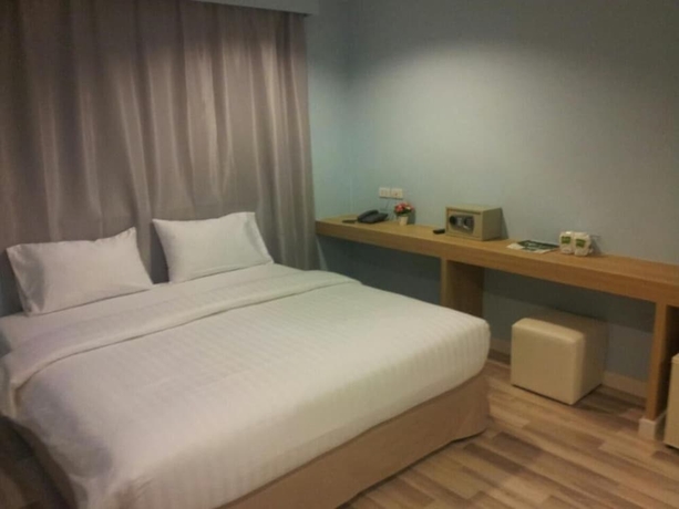 Imagen de la habitación del Hotel Nantra Cozy. Foto 10