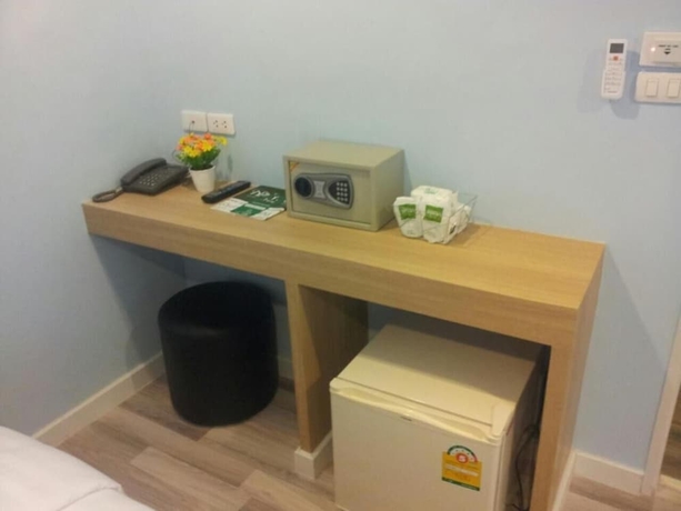 Imagen de la habitación del Hotel Nantra Cozy. Foto 11