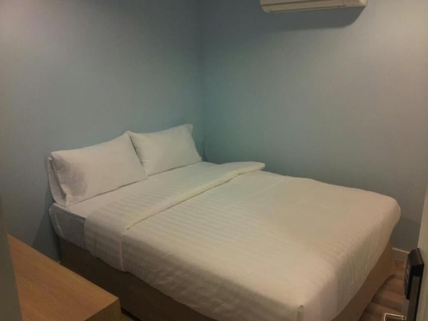 Imagen de la habitación del Hotel Nantra Cozy. Foto 12