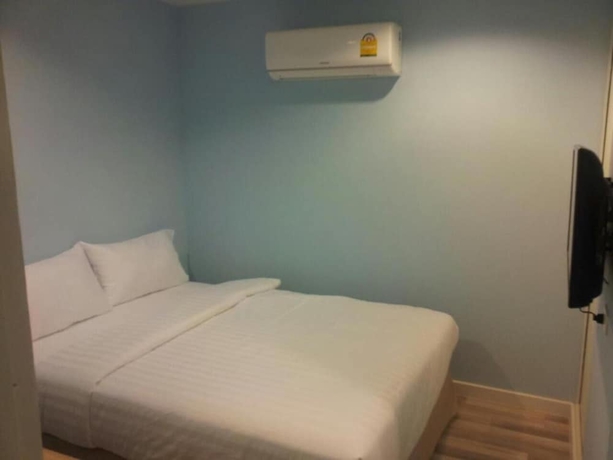 Imagen de la habitación del Hotel Nantra Cozy. Foto 13