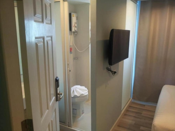Imagen de la habitación del Hotel Nantra Cozy. Foto 18
