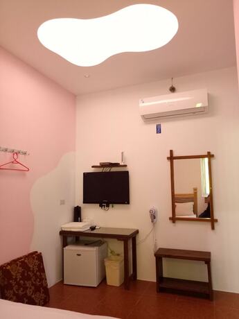 Imagen de la habitación del Hotel Nanwan Xing Zhan. Foto 17