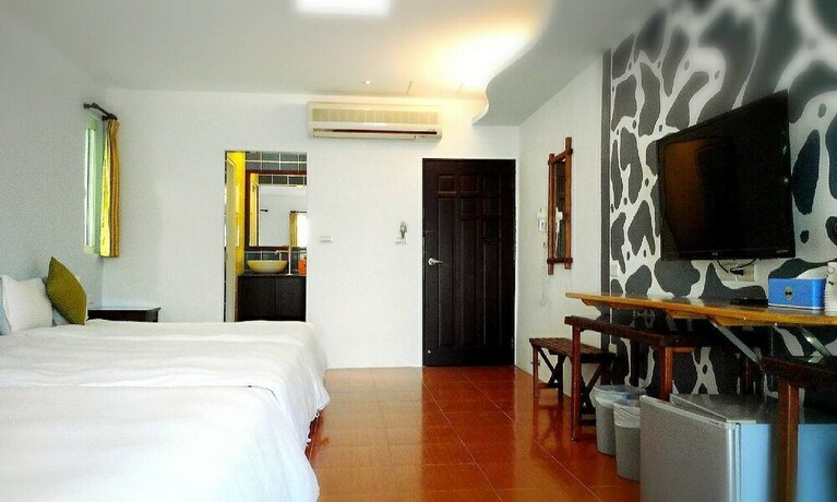 Imagen de la habitación del Hotel Nanwan Xing Zhan. Foto 22