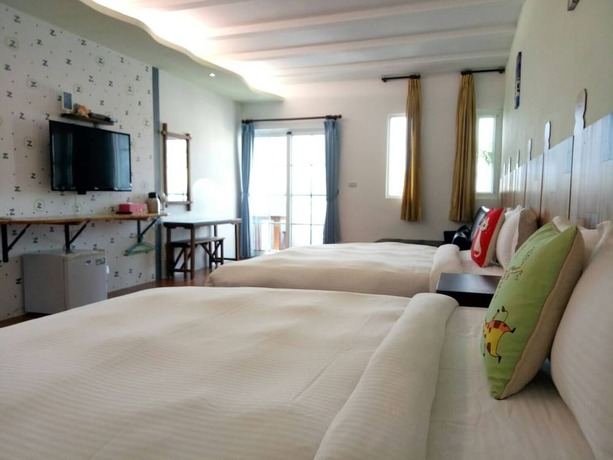 Imagen de la habitación del Hotel Nanwan Xing Zhan. Foto 23